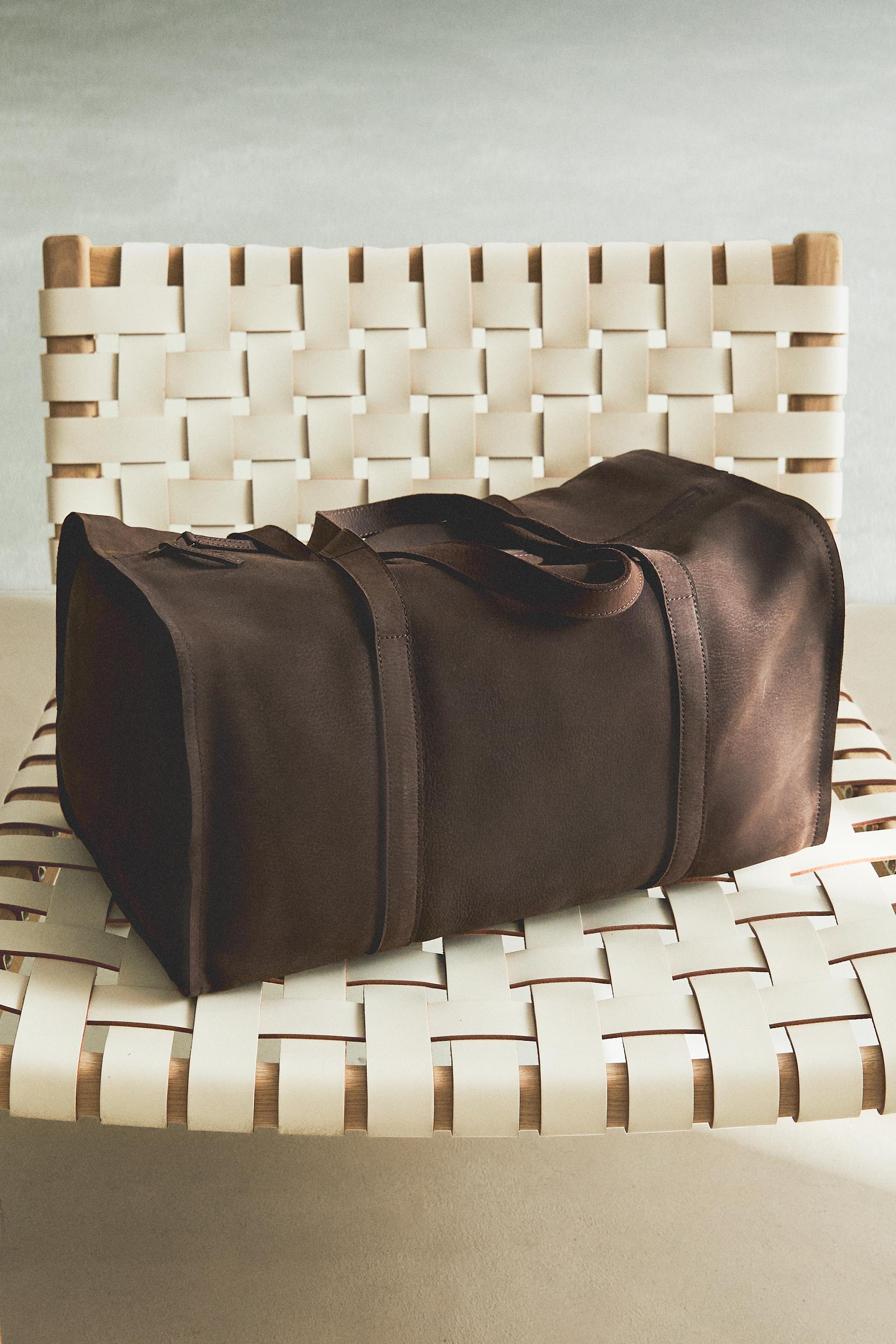 FADED LEATHER TRAVEL BAG